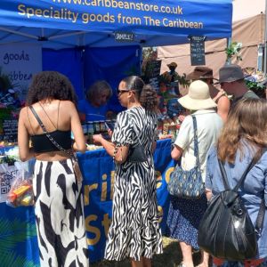 People at the Caribbean Store Booth At Reading Food Festival